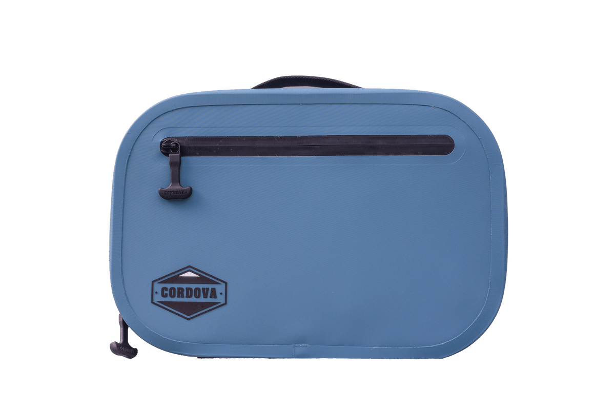 BACKCOUNTRY CLASS™ COOLER LUNCH BAG in blue with a textured shell, black top zipper, carry handle and Cordova logo