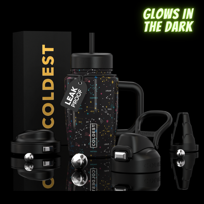 COLDEST 15oz Limitless Ultra tumbler with a black starry pattern, straw, handle, and matching accessories