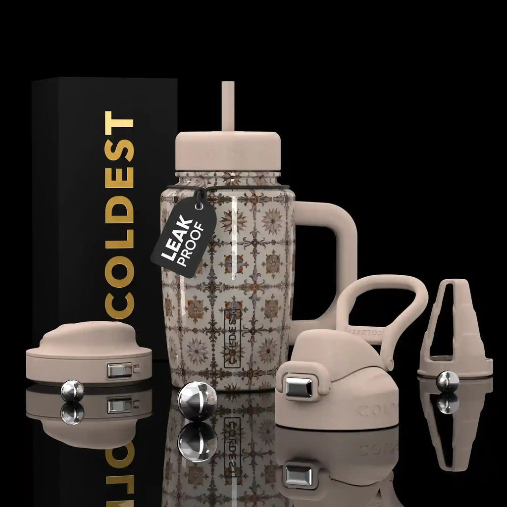 COLDEST 15oz Limitless Ultra insulated tumbler with clear floral-patterned body, pale pink handle, straw and interchangeable lids