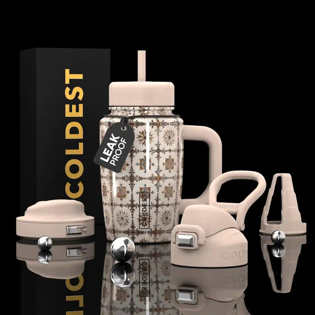 COLDEST 15oz Limitless Ultra stainless steel tumbler with ornate floral pattern, pale pink lid, straw, handle and accessories