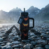 COLDEST 24oz Limitless bottle with a dark multicolored cosmic pattern, black lid, straw, and side handle