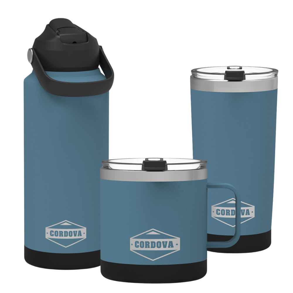 Drinkware Bundle with three blue stainless steel vessels, including a handled camp mug, tall tumbler, and bottle with black lid